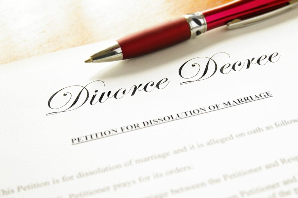 divorce certificate ontario family law lawyer pen on paper.