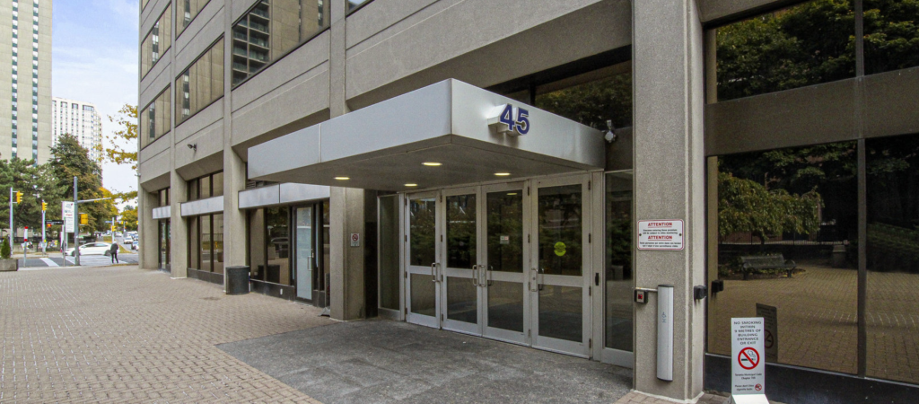 Exterior view of the Progressive Legal Solutions office at 45 Sheppard Ave East, Toronto, Ontario, showing a front of the building